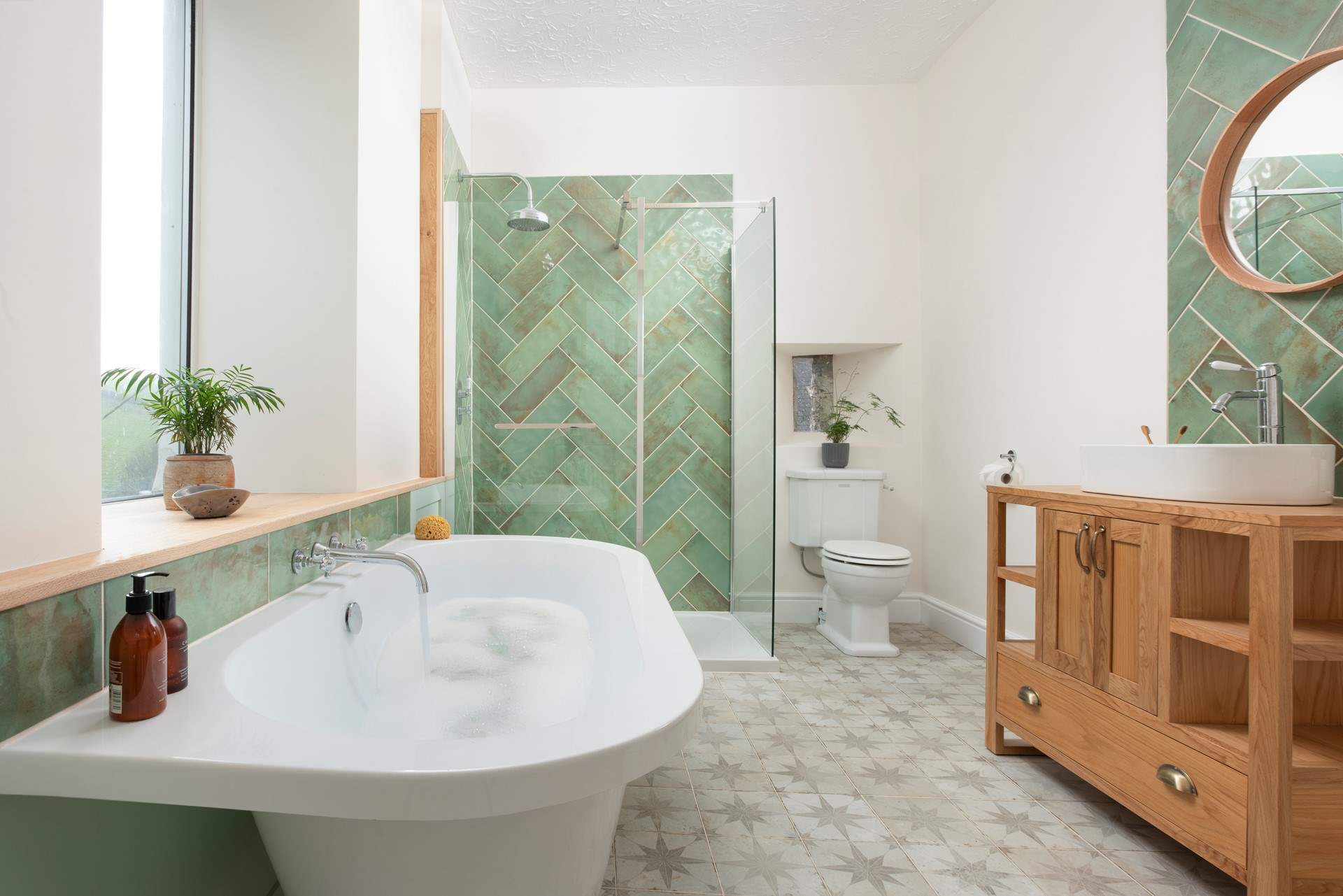 Steps lead from the bedroom down to the beautiful en suite. 