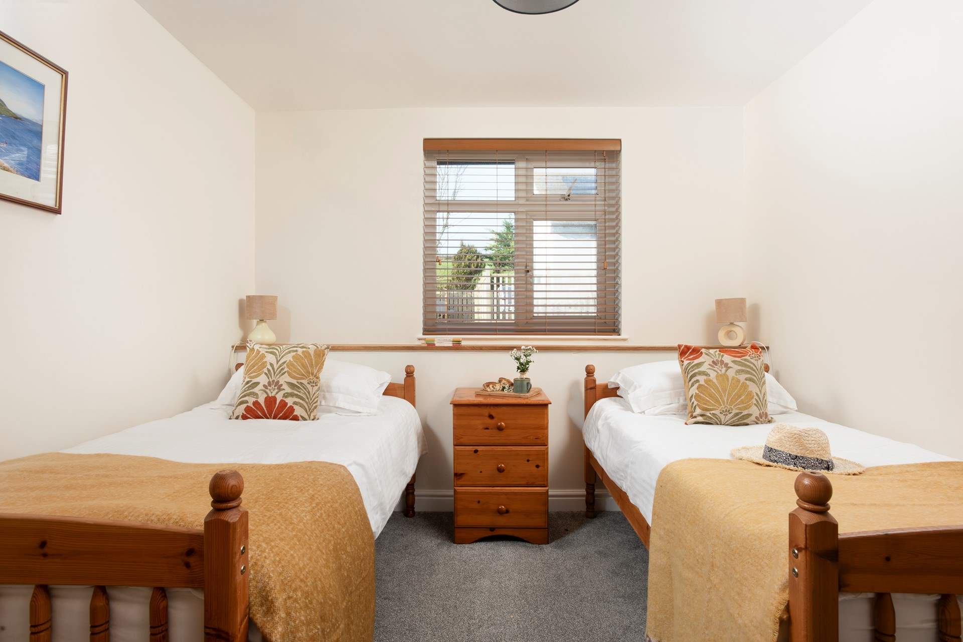 Twin beds await in bedroom 4.