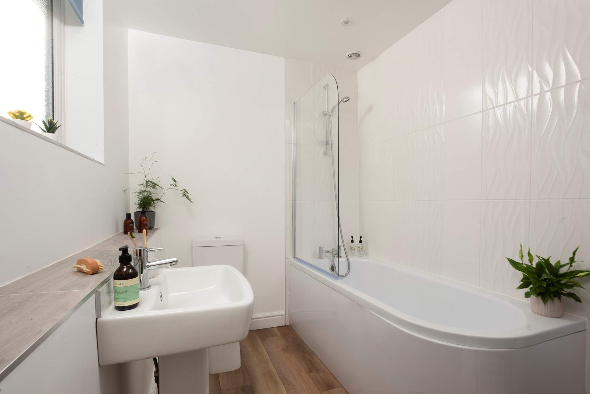 The family bathroom on the first floor has a bath and fitted shower.