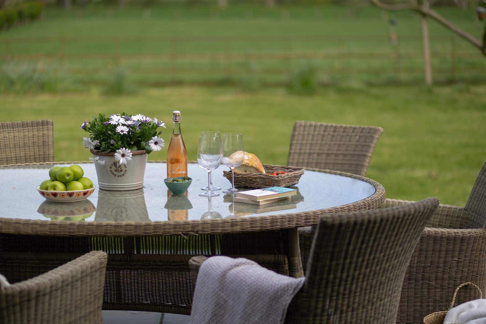 The large patio has lovely furniture to sit awhile and relax.
