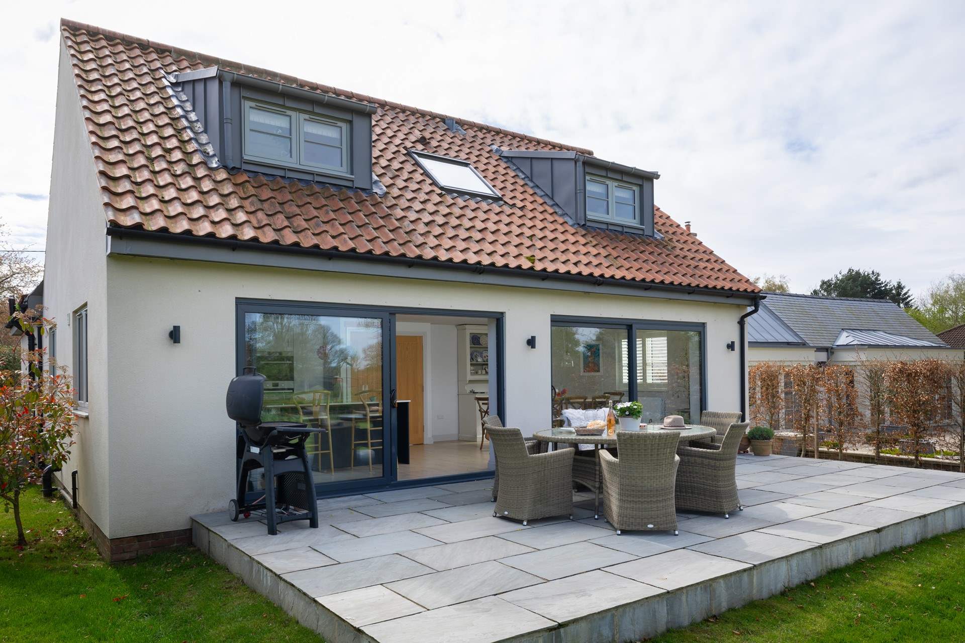 The lovely patio showing the large bi-fold doors.