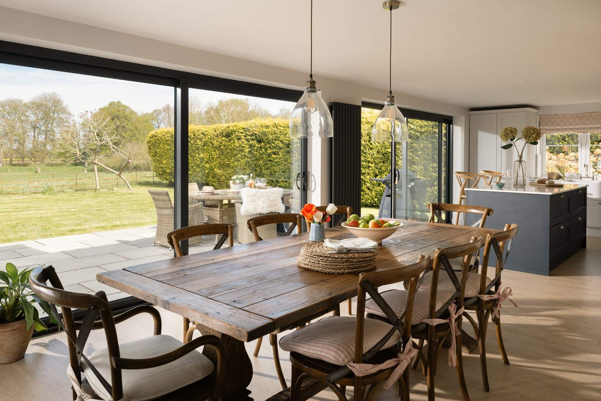 The open plan kitchen/dining-room has full width bi-fold doors to the garden.