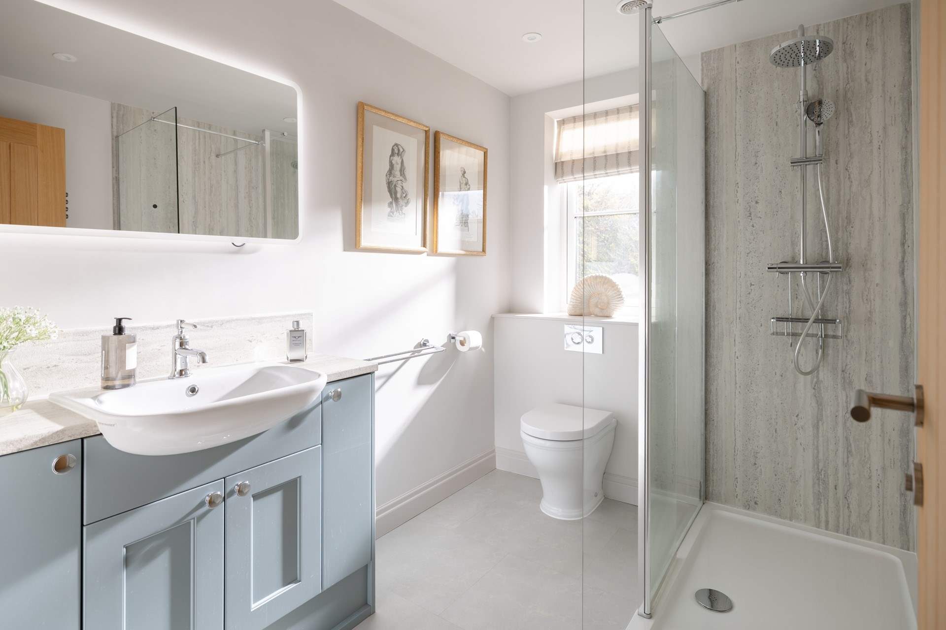 The en suite shower-room is spacious.