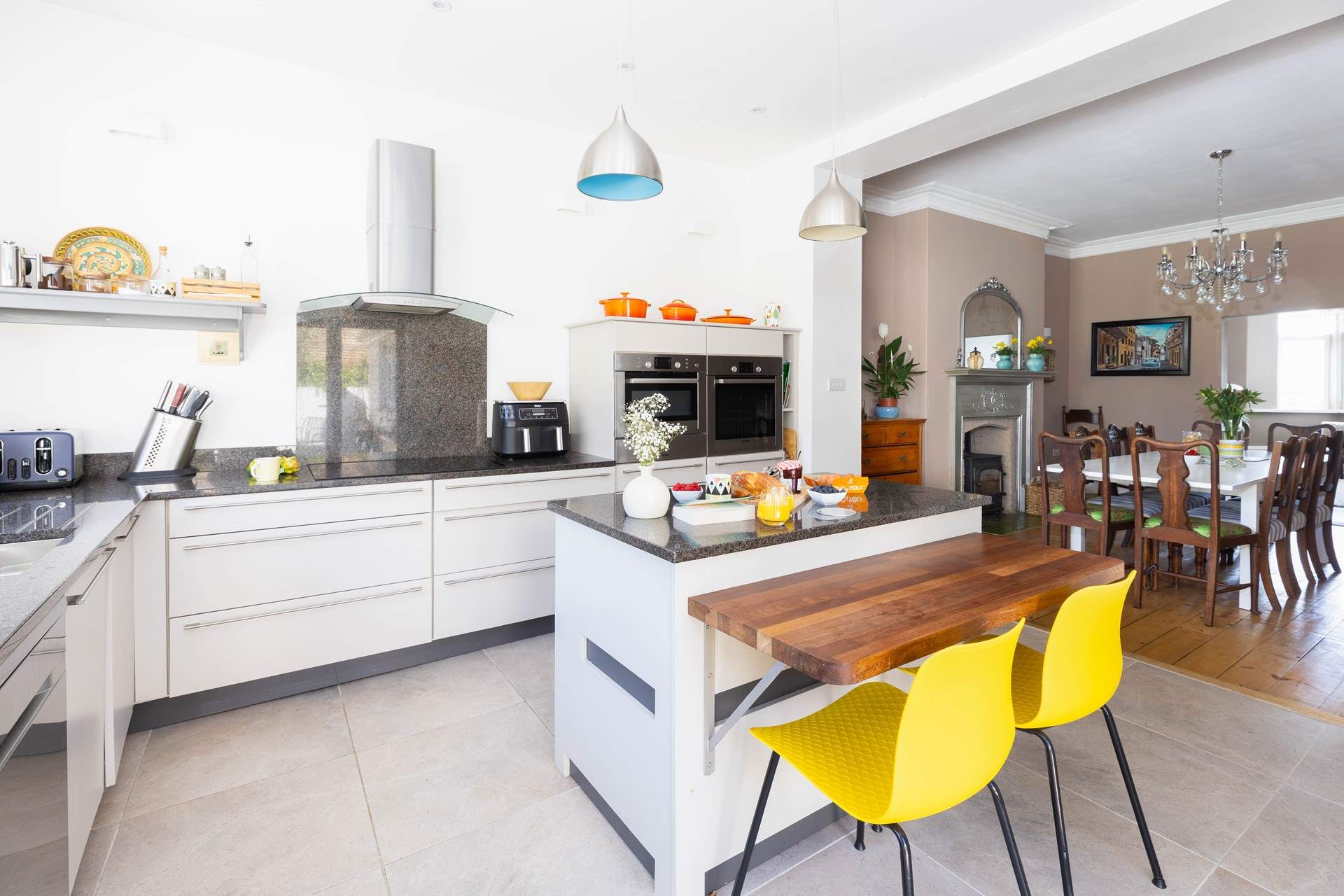 The light and airy open plan living space spans the length of the house.
