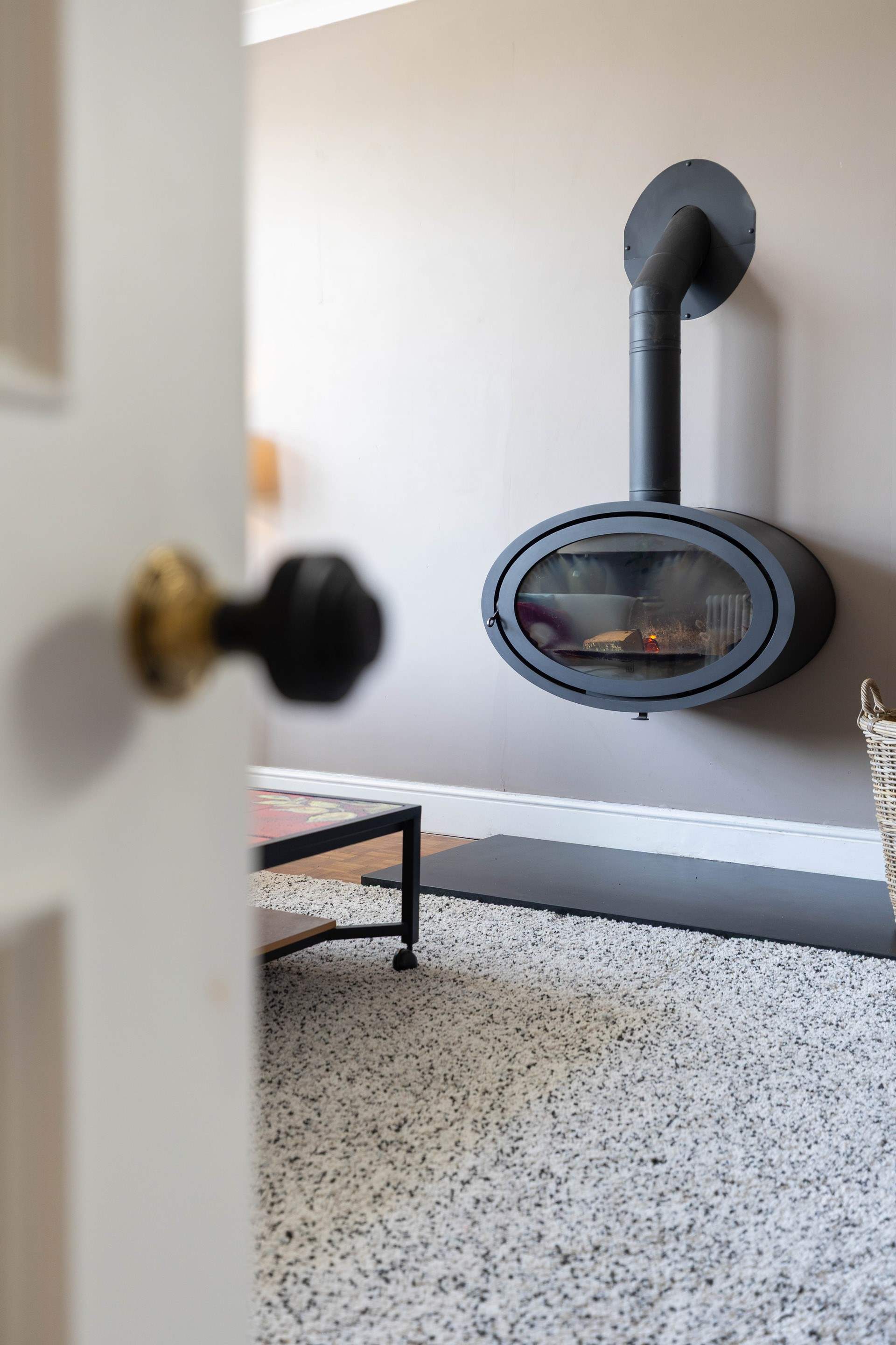 Peaking through to this stunning wood-burner. 