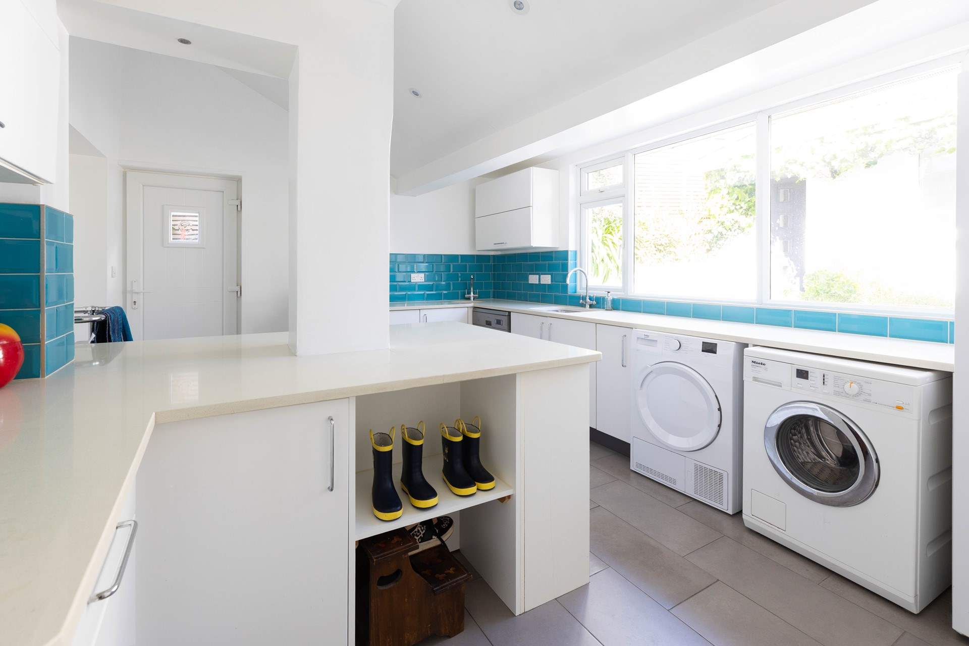 Along with lots of storage for all your holiday clobber and of course washing machine and tumble-drier. 