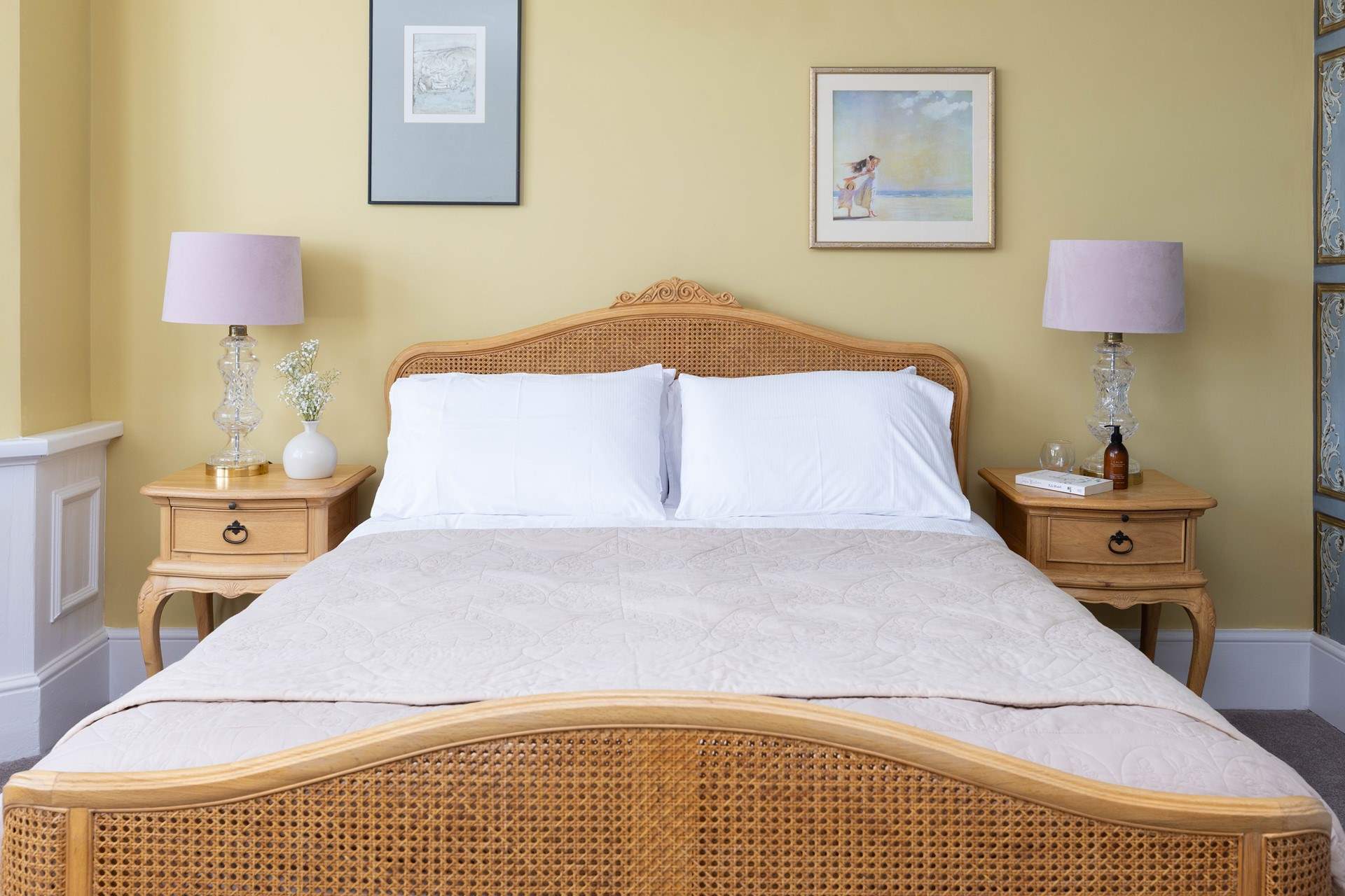 This beautiful bedroom has a king size bed. 