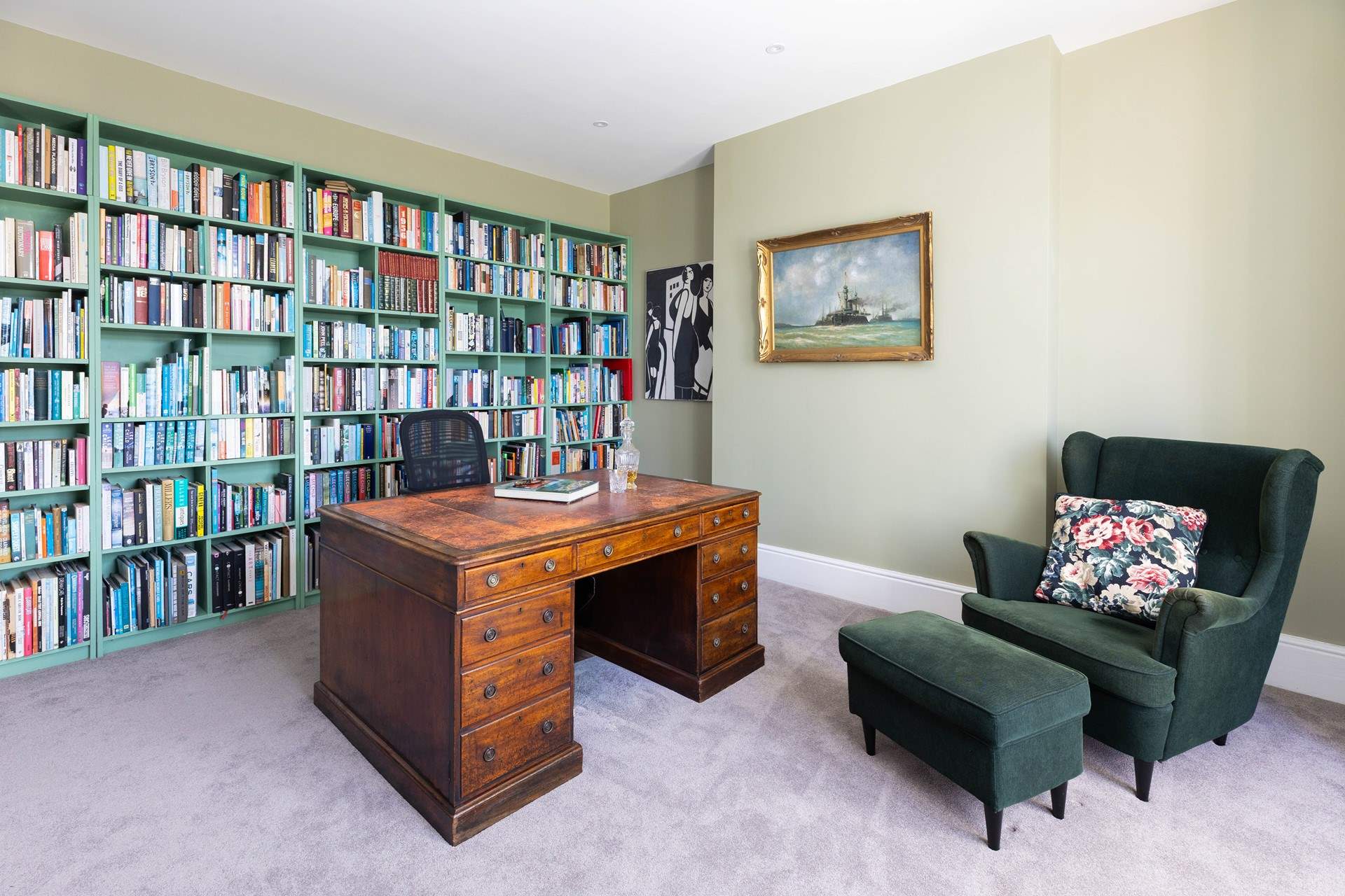 The study is a lovely place to have a quiet moment with a good book. 