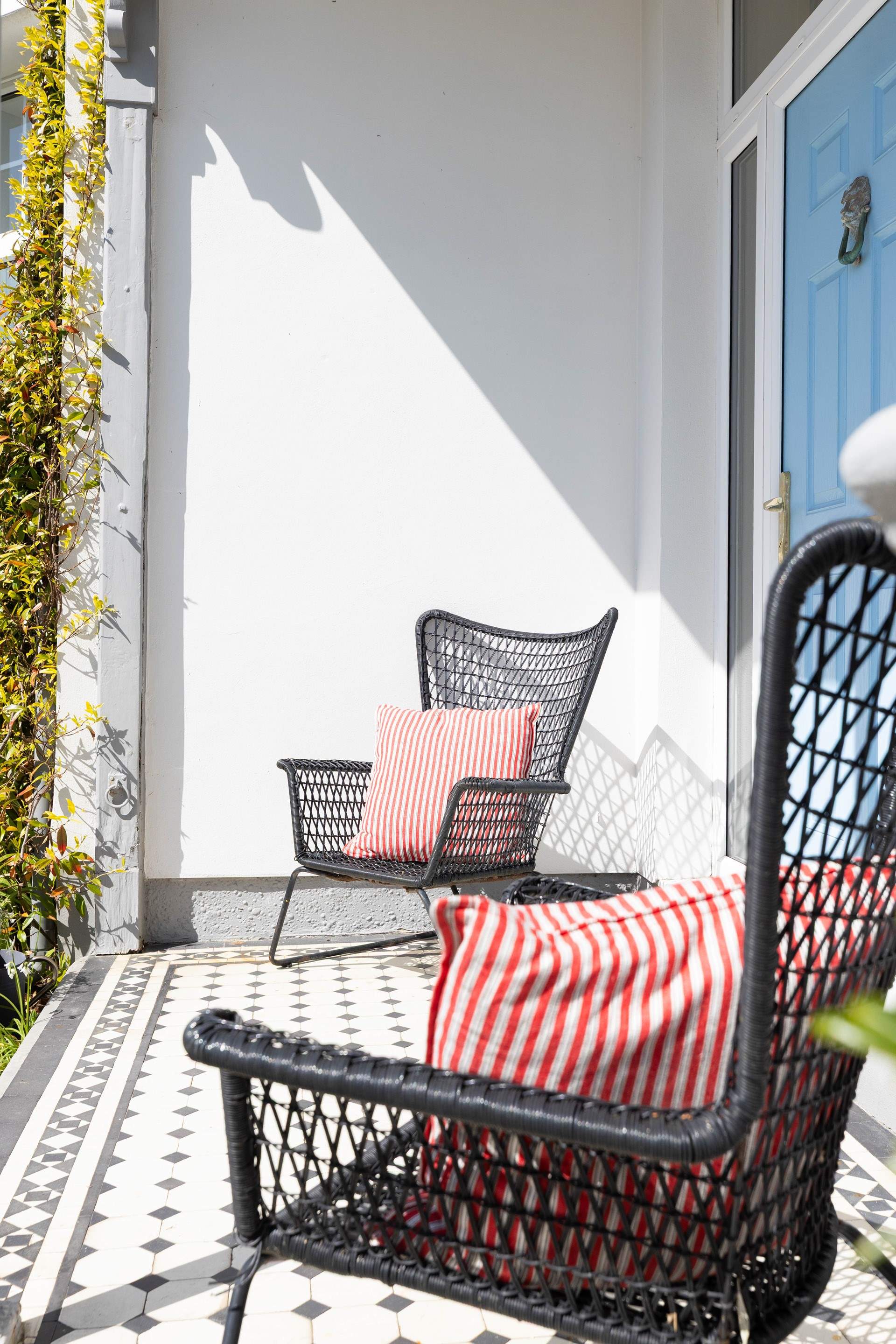 Bask in the sunshine at the front of the house. 