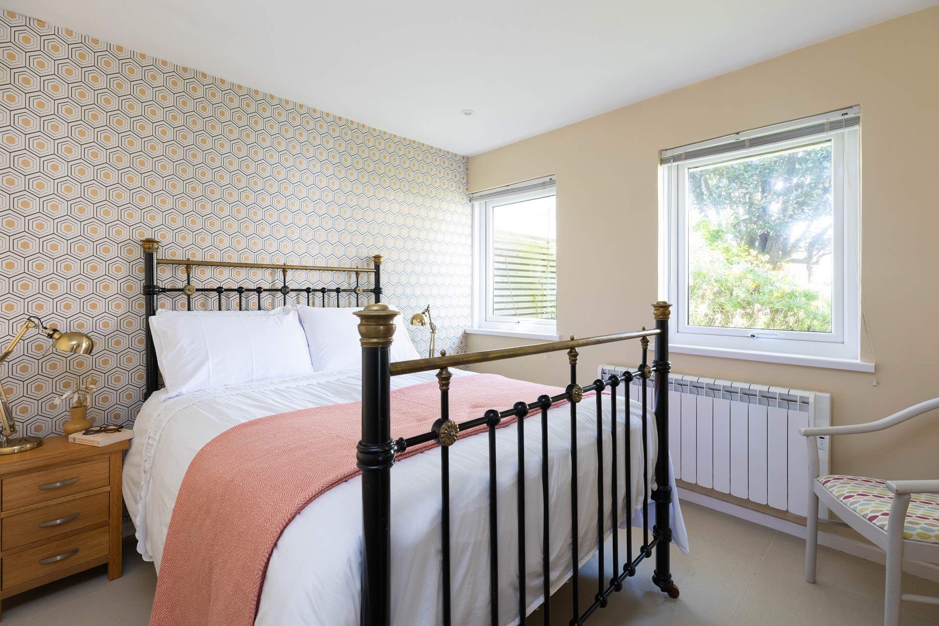 The bedroom in the annex overlooks the garden with a cosy double bed. 