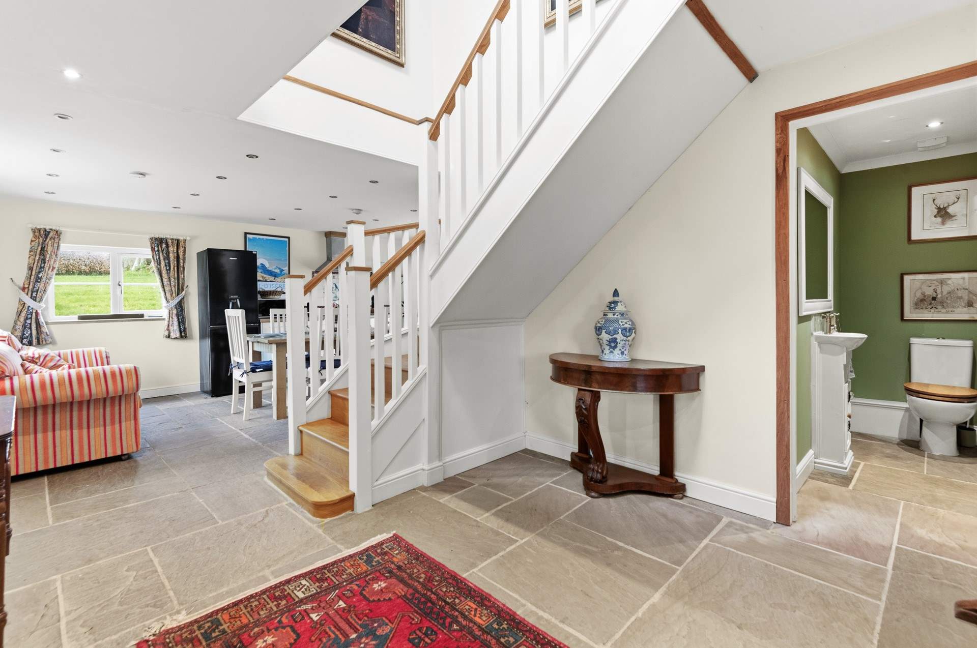 The entrance hall links the ground floor perfectly, with the stairs to the first floor leading up just outside of the kitchen area.