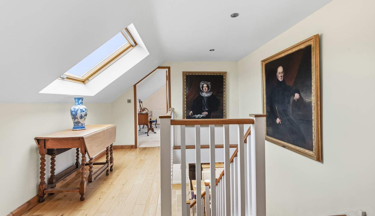 The first floor landing links the two bedrooms. A bedroom at each end of the hallway.