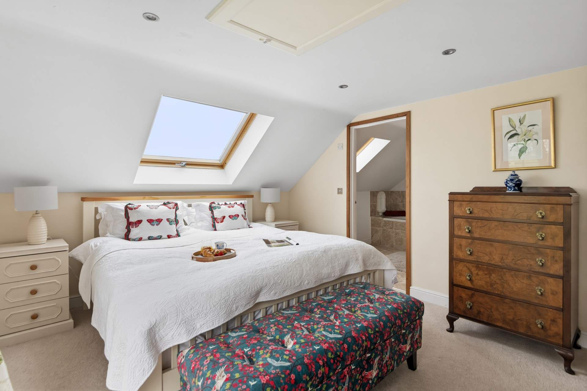 Bedroom 1 also boasts an en suite bathroom.