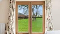 Open the patio doors and step out into your private and enclosed garden area.