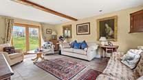 The sitting-room is characterful, charming and cosy.