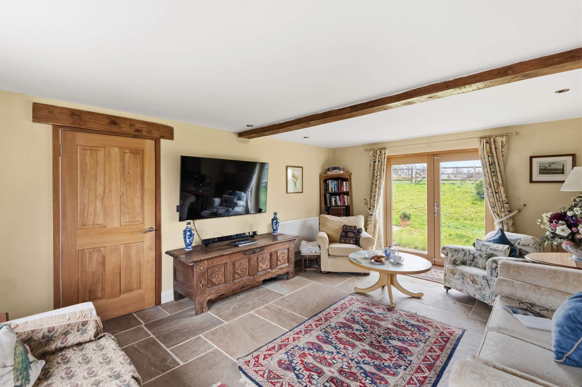 The sitting-room oozes charm and class.