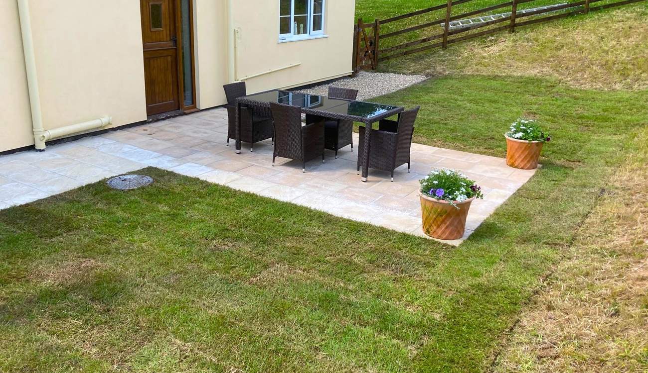 The patio dining-area is perfectly located outside of the kitchen, making serving up any meal al fresco so easy to do.