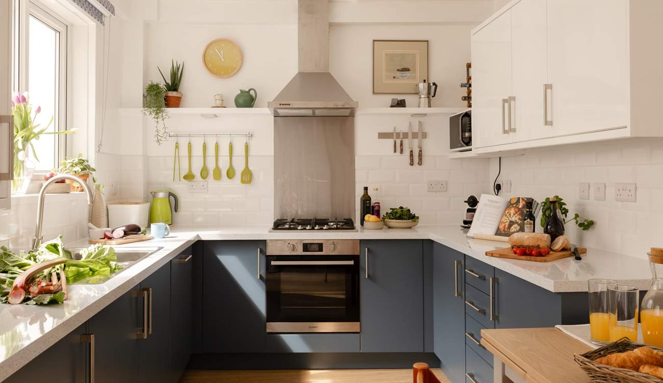 This spacious light-filled kitchen is just waiting for you to cook.