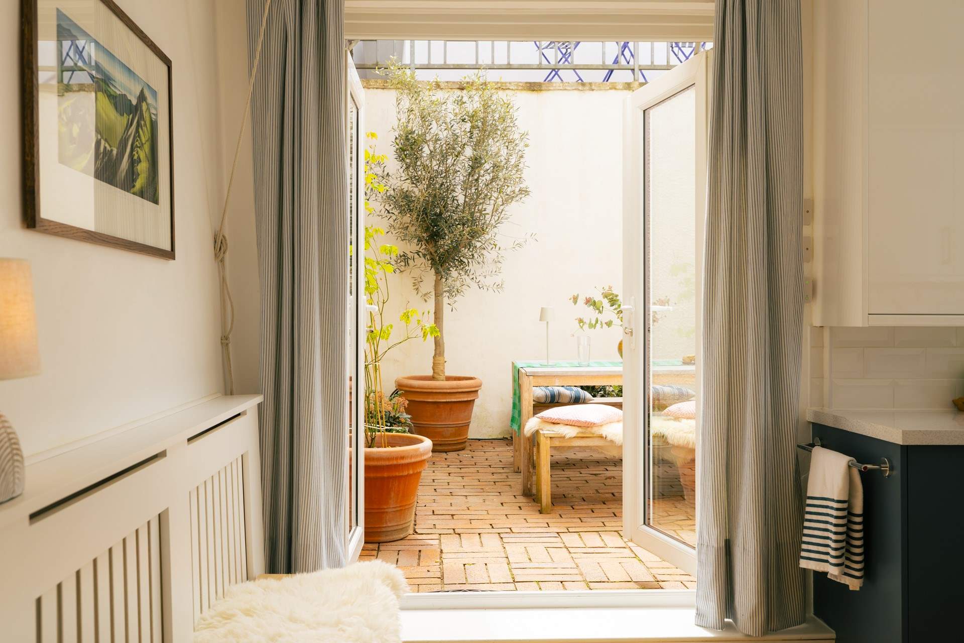 Open the doors and bring the outside in.
