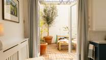 Open the doors and bring the outside in.