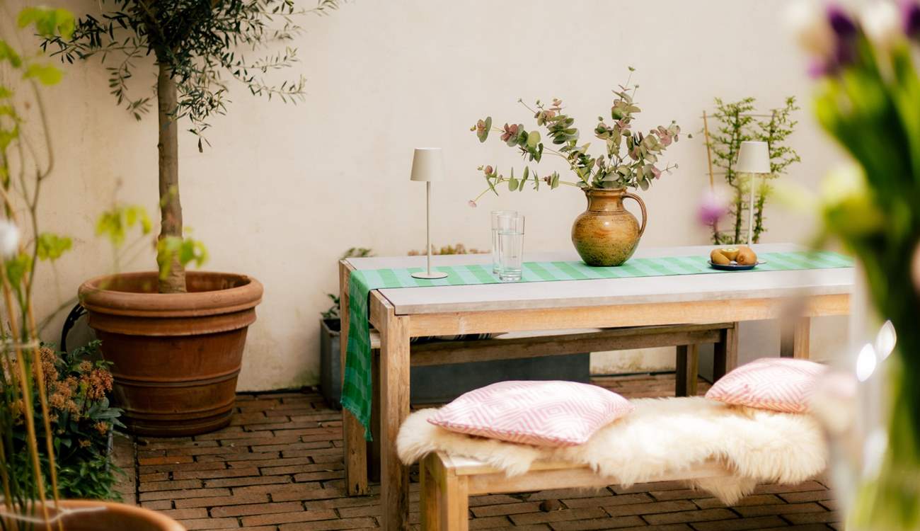 Al fresco dining is a must in this hidden gem of a courtyard.