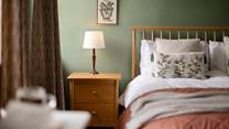Retire to the cosy bedrooms after a day exploring the hills.