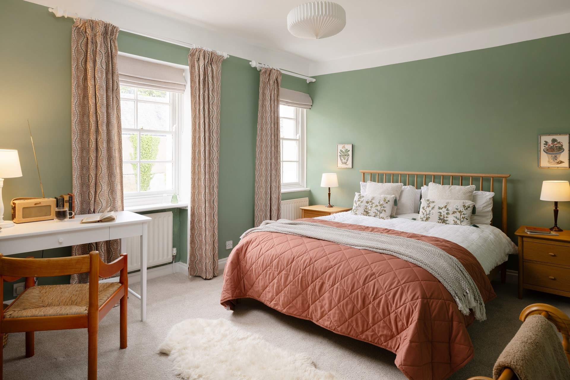 Bedroom 1 is charming and designed to retain its original character.