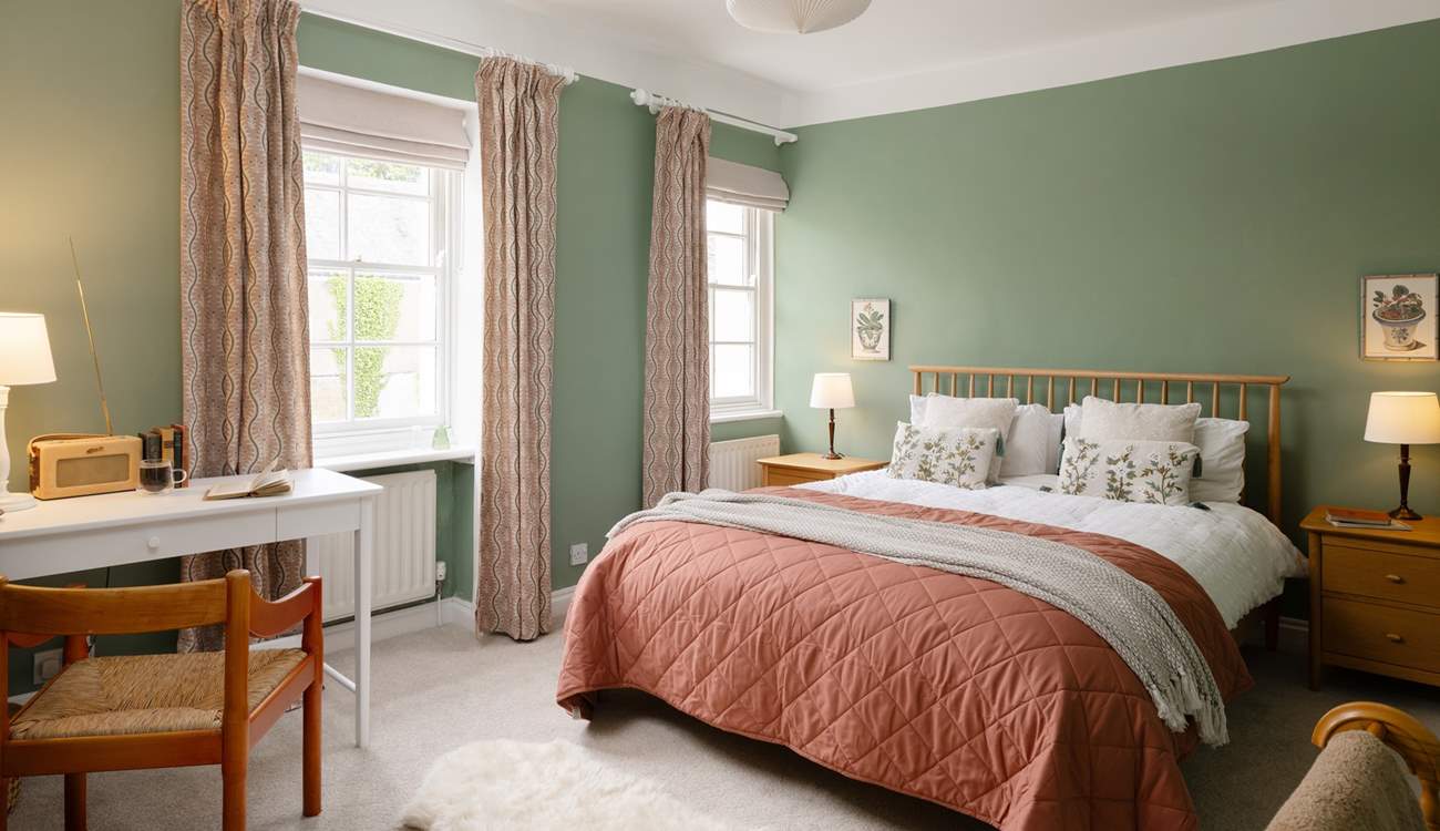 Bedroom 1 is charming and designed to retain its original character.