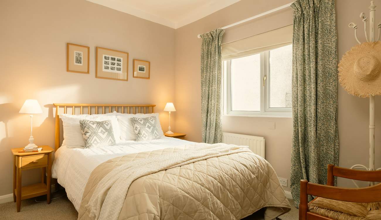 Bedroom 2 has a cosy cottage feel.