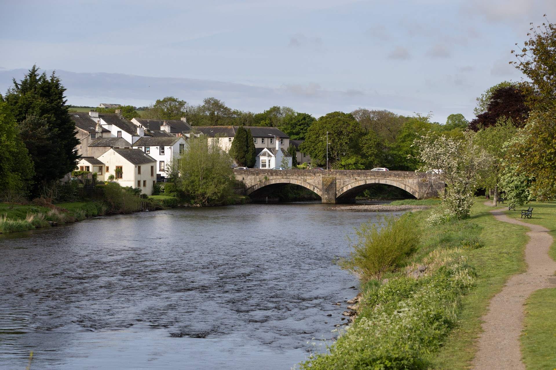 Stroll along the river at the bottom of the lane.