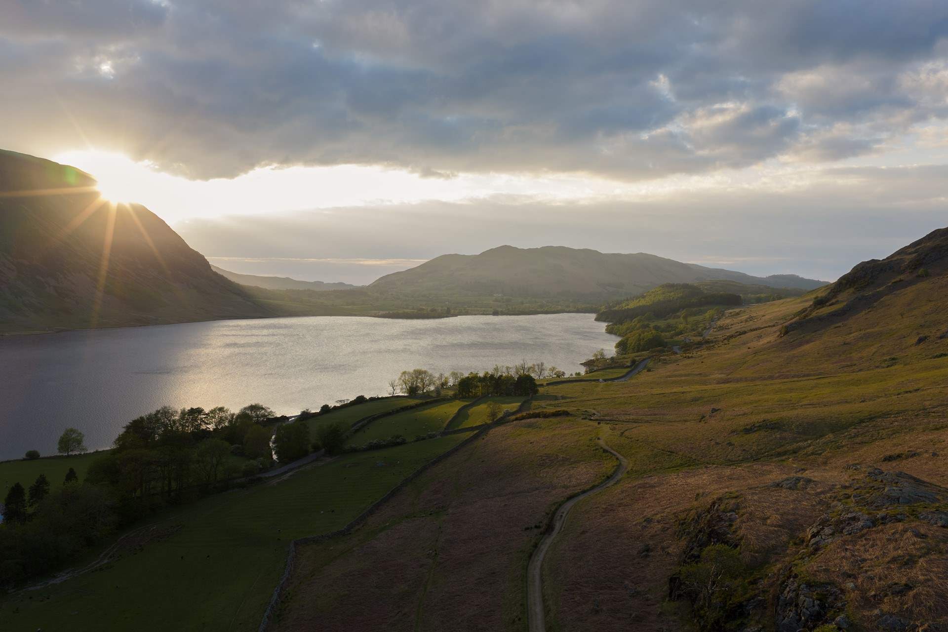 The sun rising over Crummock Water.