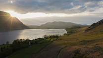 The sun rising over Crummock Water.