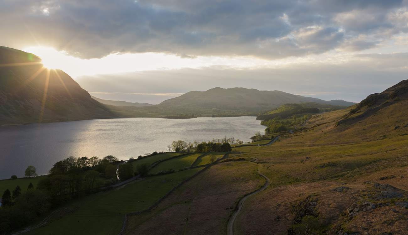 The sun rising over Crummock Water.