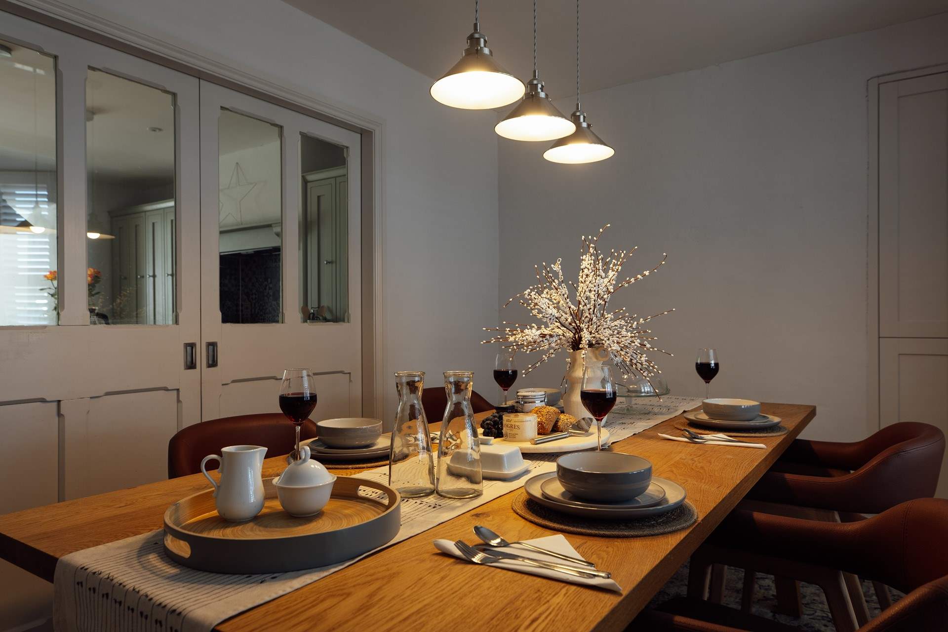 The stylish dining-room not only creates an inviting atmosphere, it exudes a sense of ease. 