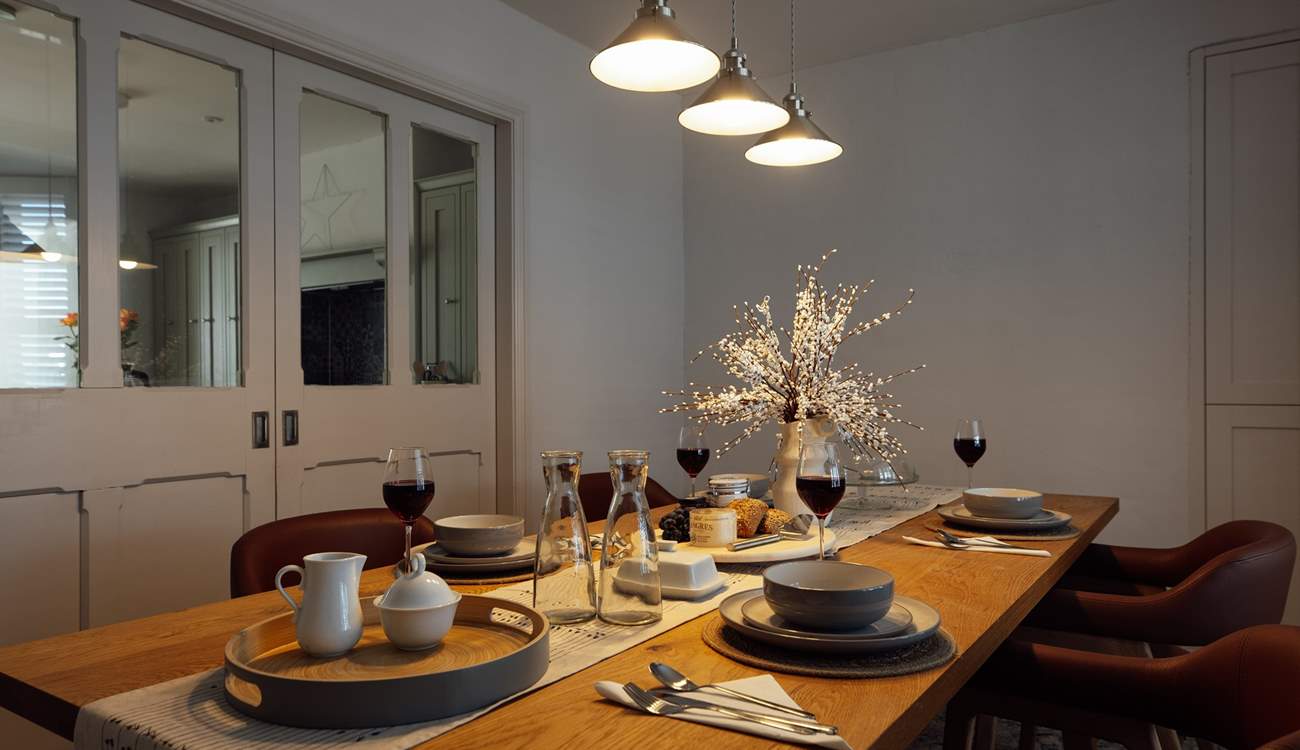 The stylish dining-room not only creates an inviting atmosphere, it exudes a sense of ease. 