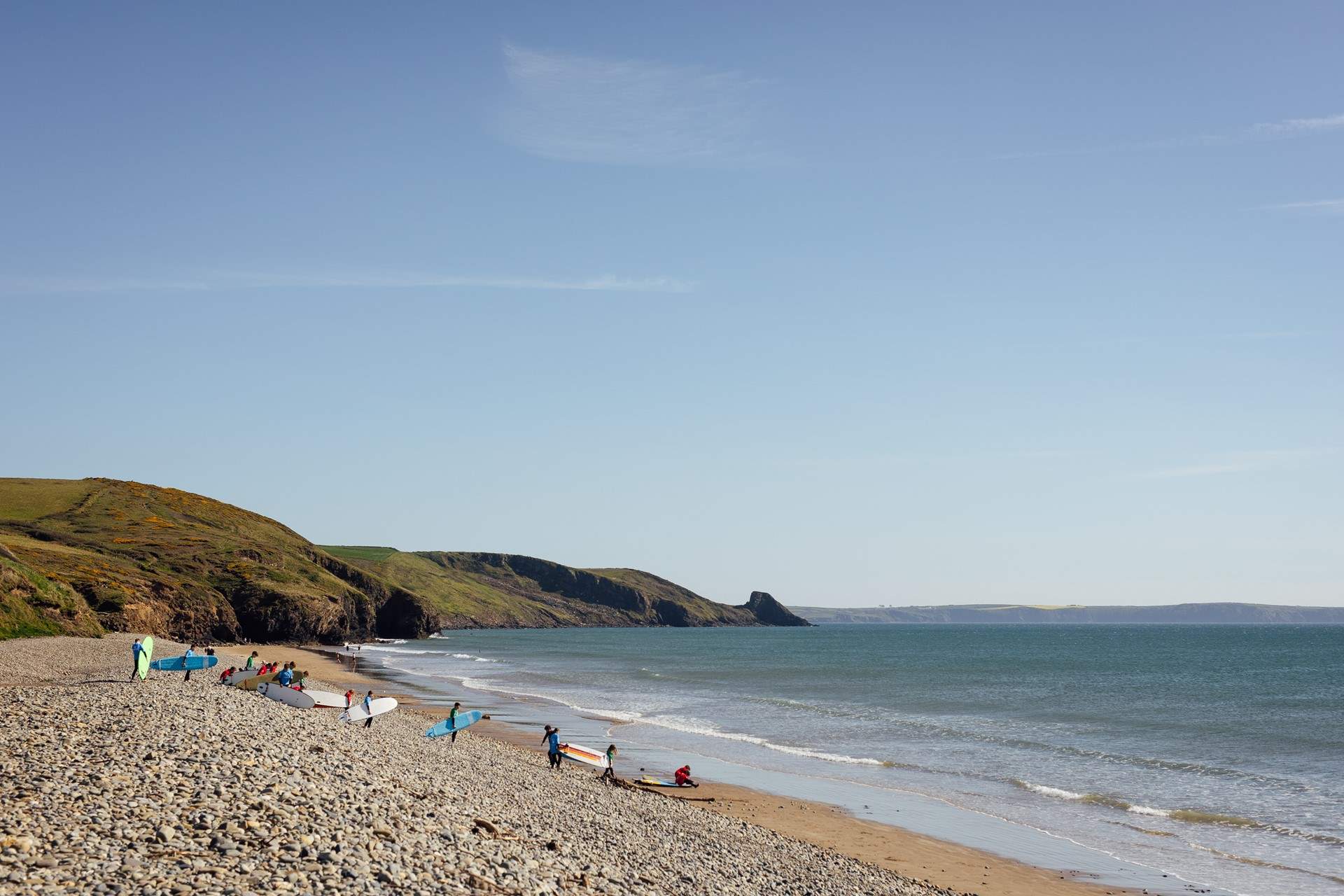 Surfers at Newgale beach. 