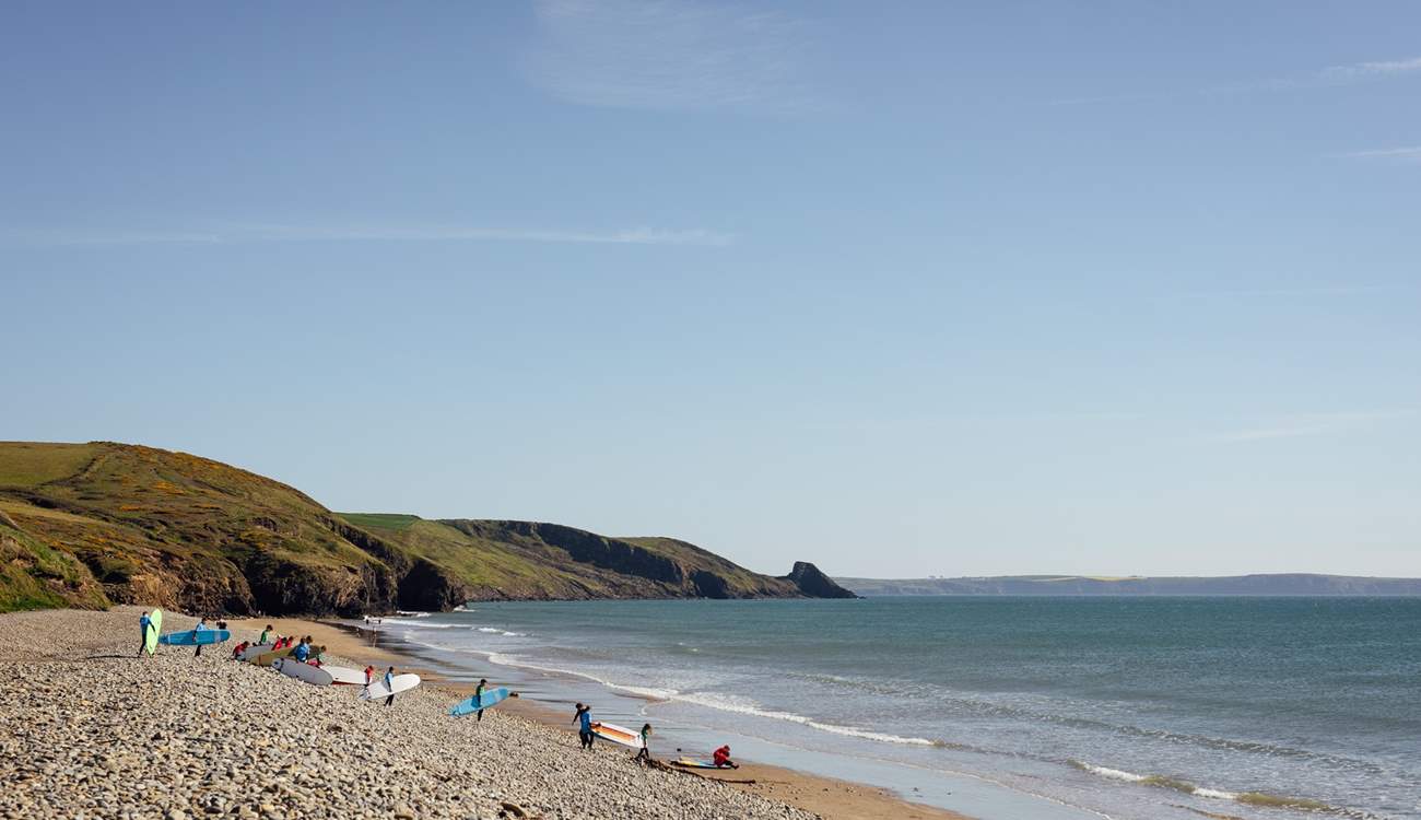 Surfers at Newgale beach. 