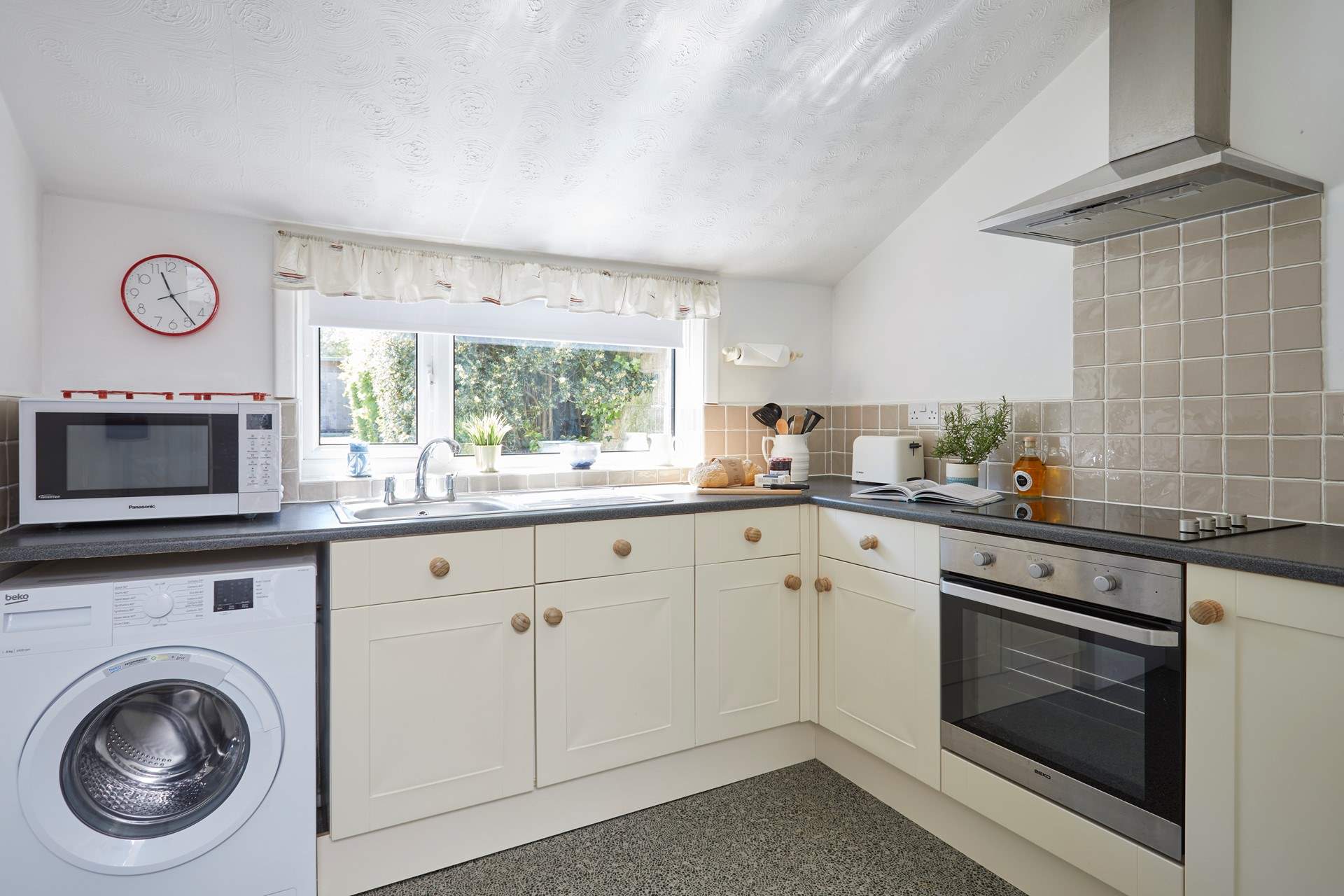 The kitchen overlooks the pretty garden.