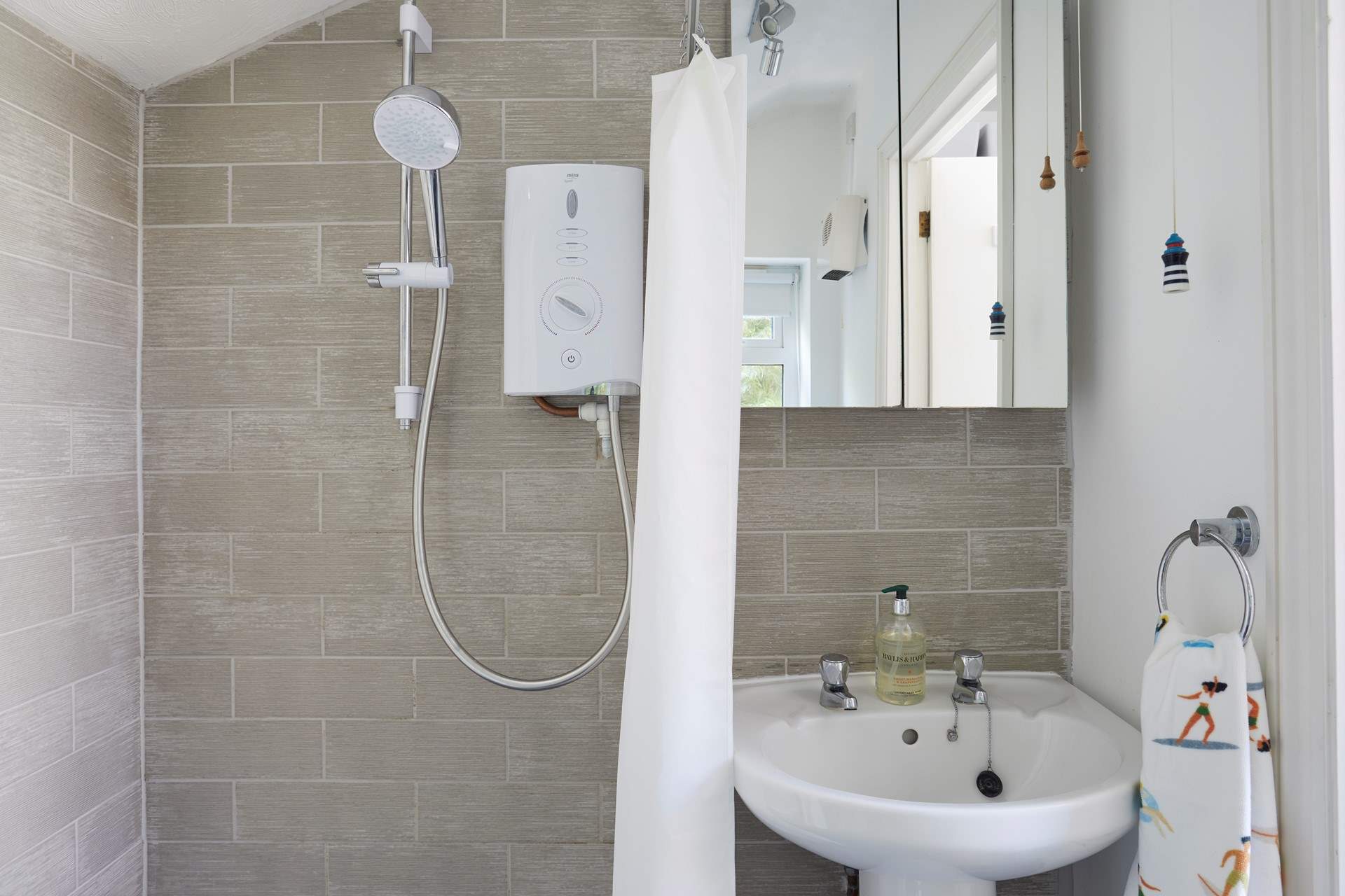 Handy for washing off those sandy toes. 