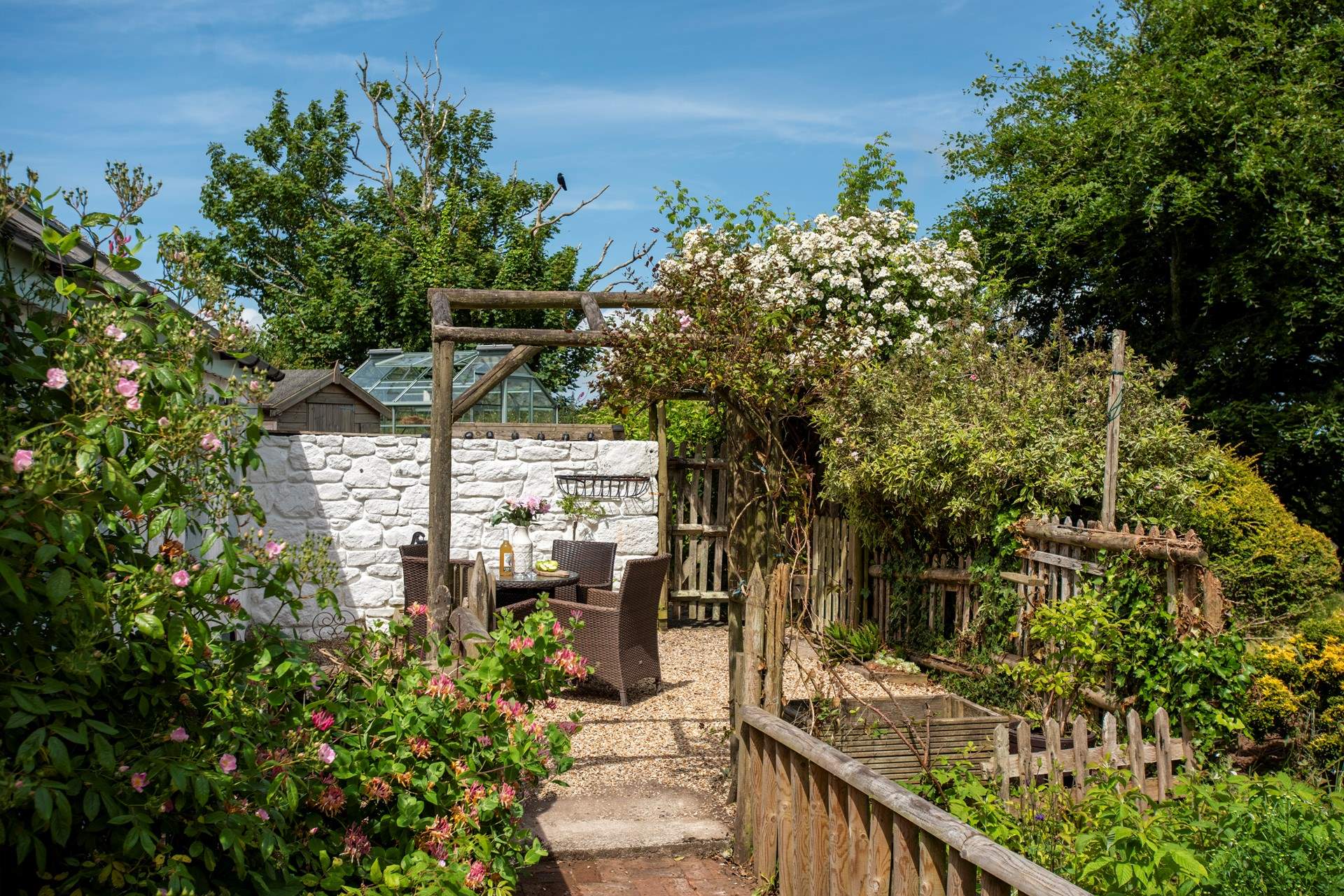 Every corner of this charming garden has been thoughtfully planted.
