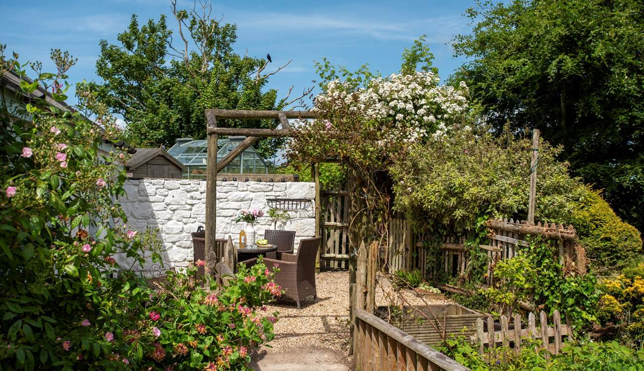 Every corner of this charming garden has been thoughtfully planted.