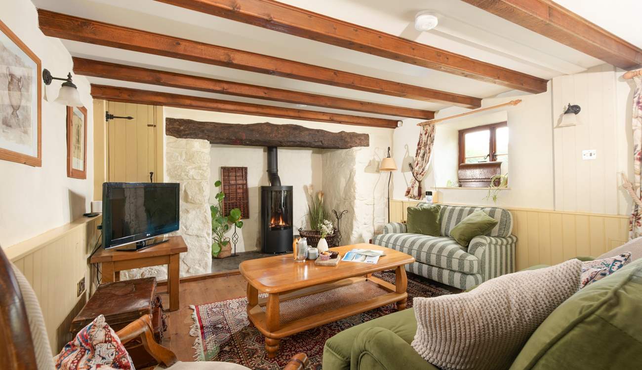 Sink into the comfort of this cosy sitting-room.