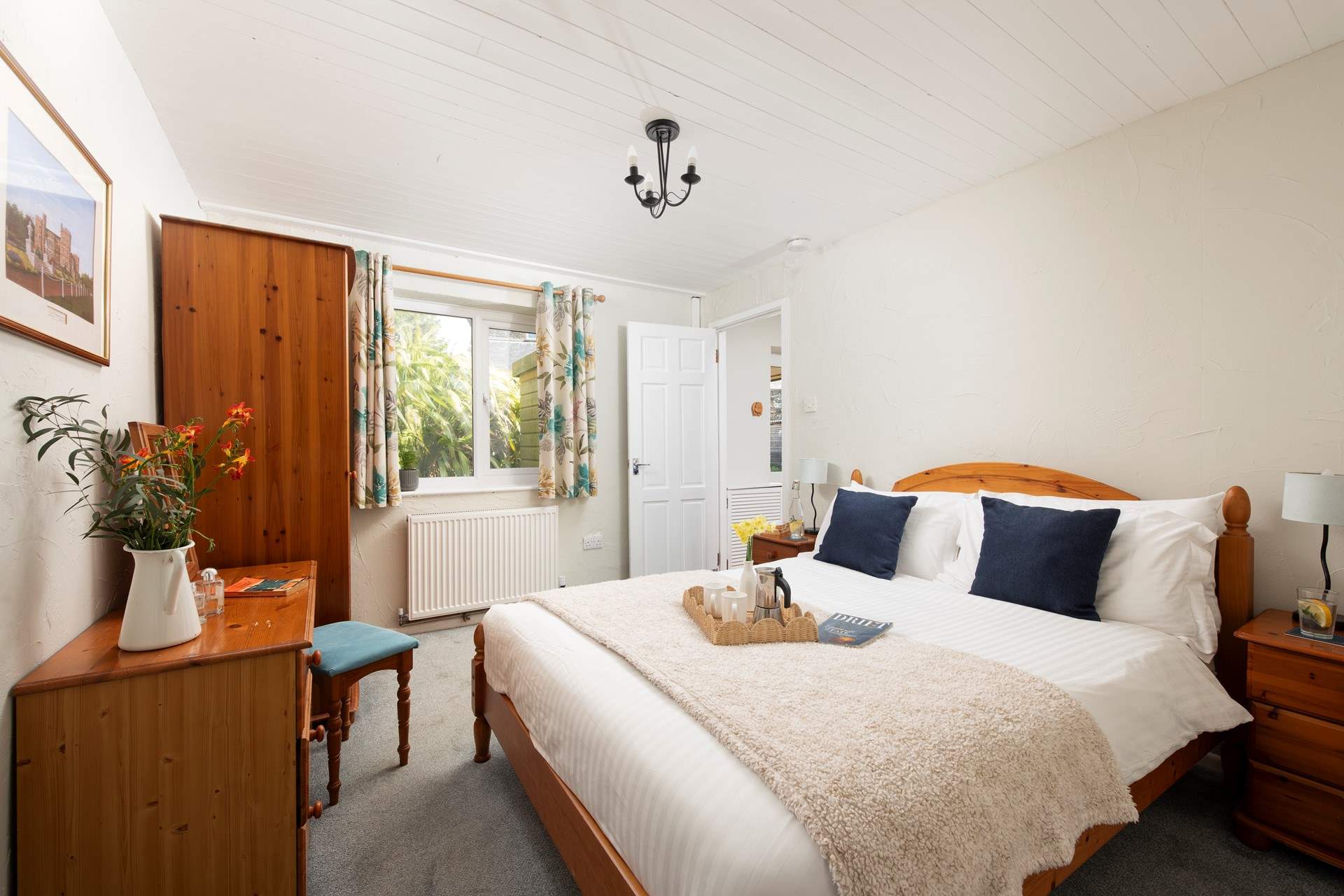 Snuggle under the covers in bedroom 1.