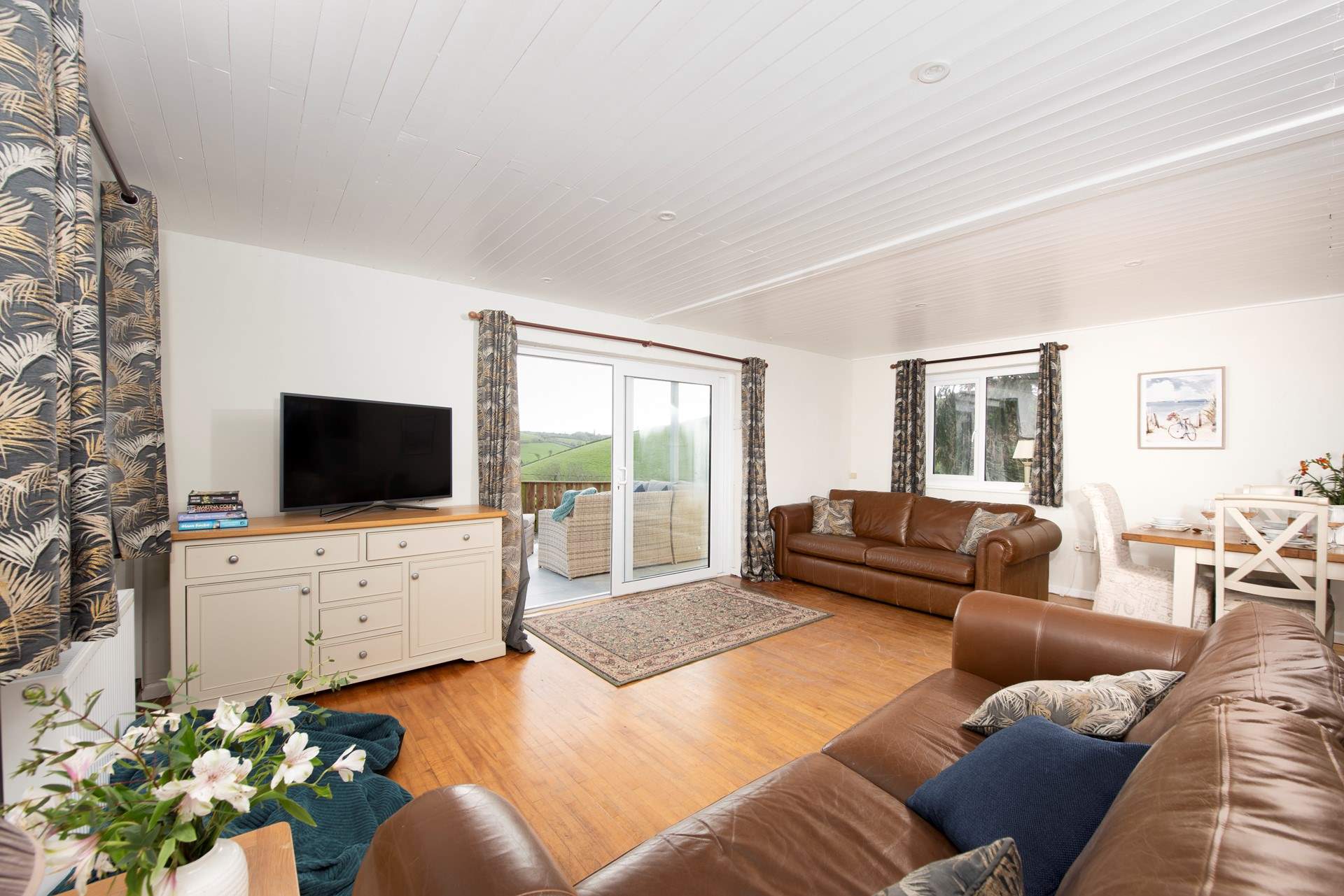 The sliding doors invite you outside to enjoy the fresh air.