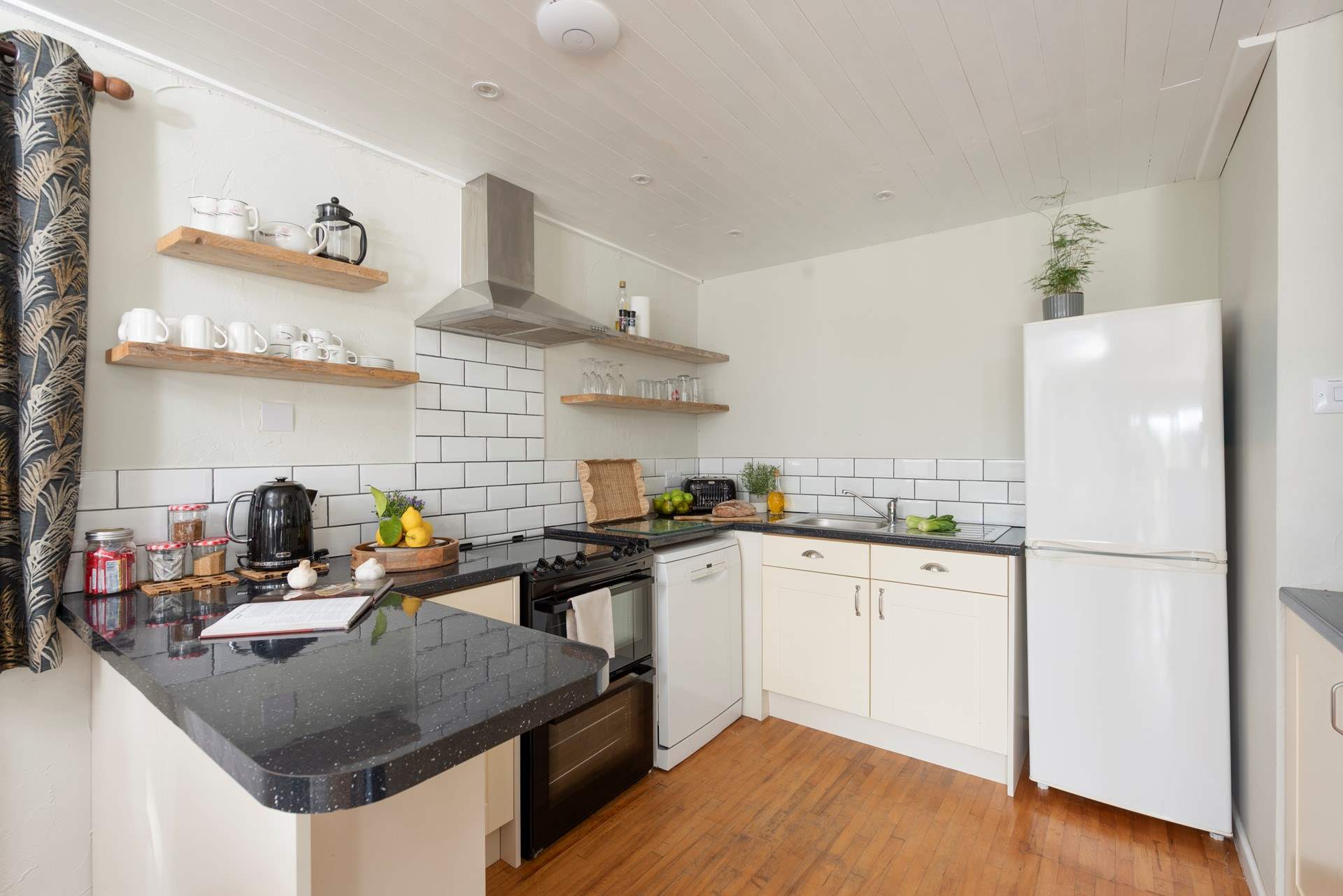 The sleek kitchen has all you need to cook up a feast.