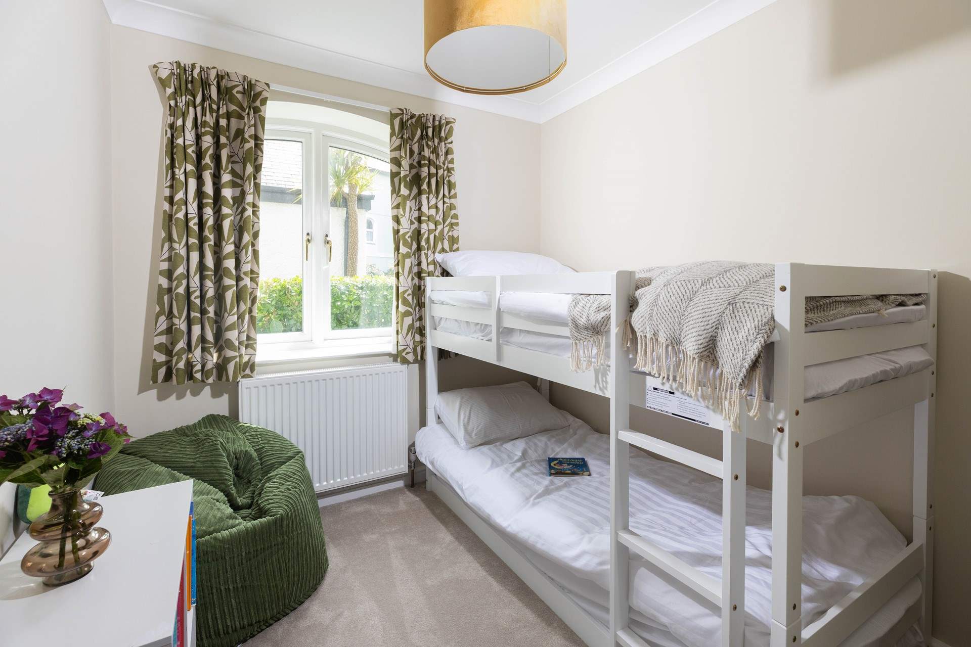 The cute bunk bedroom. 