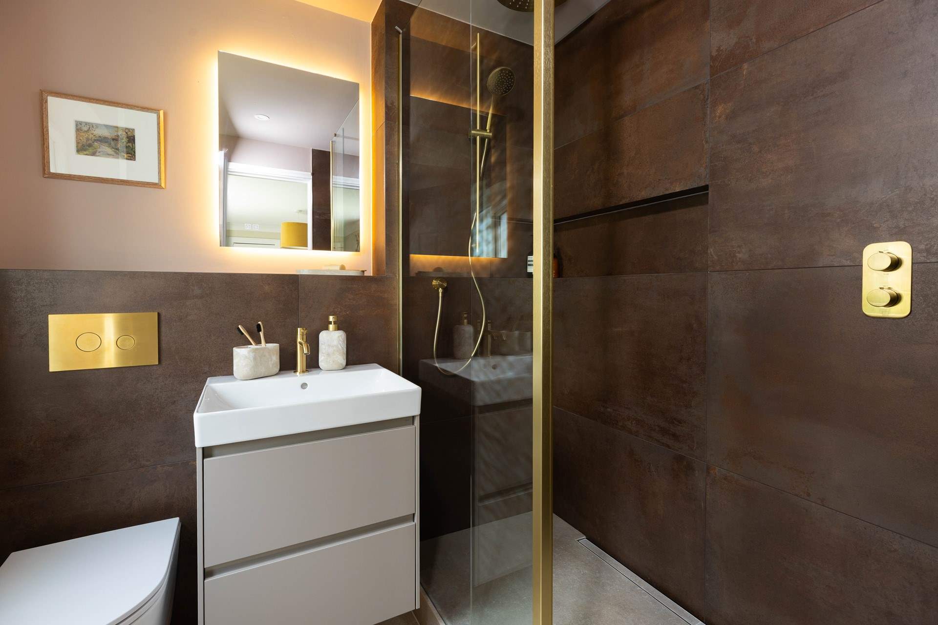 This is a beautiful shower-room. 
