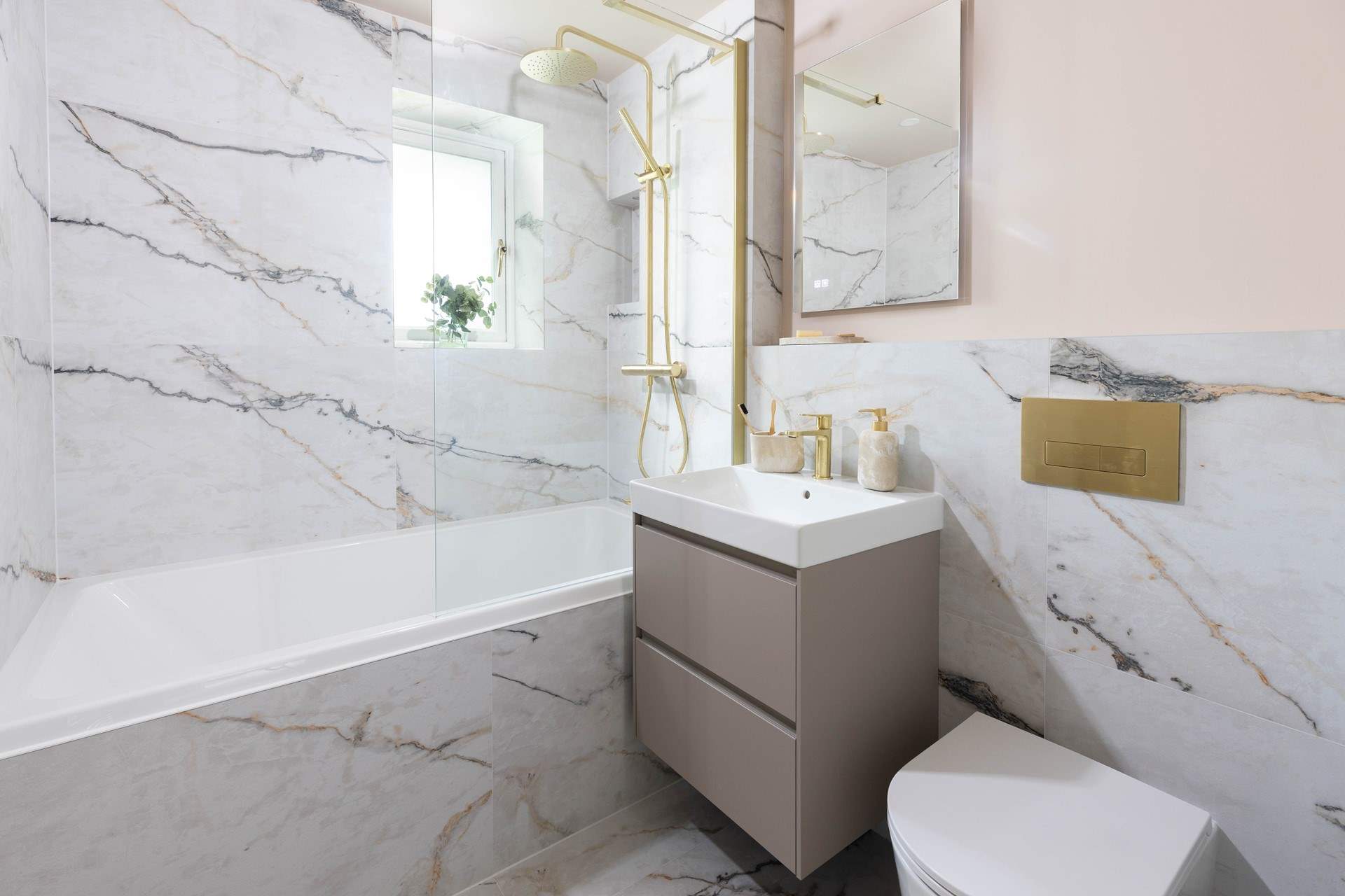 The stunning luxurious family bathroom with underfloor heating. 
