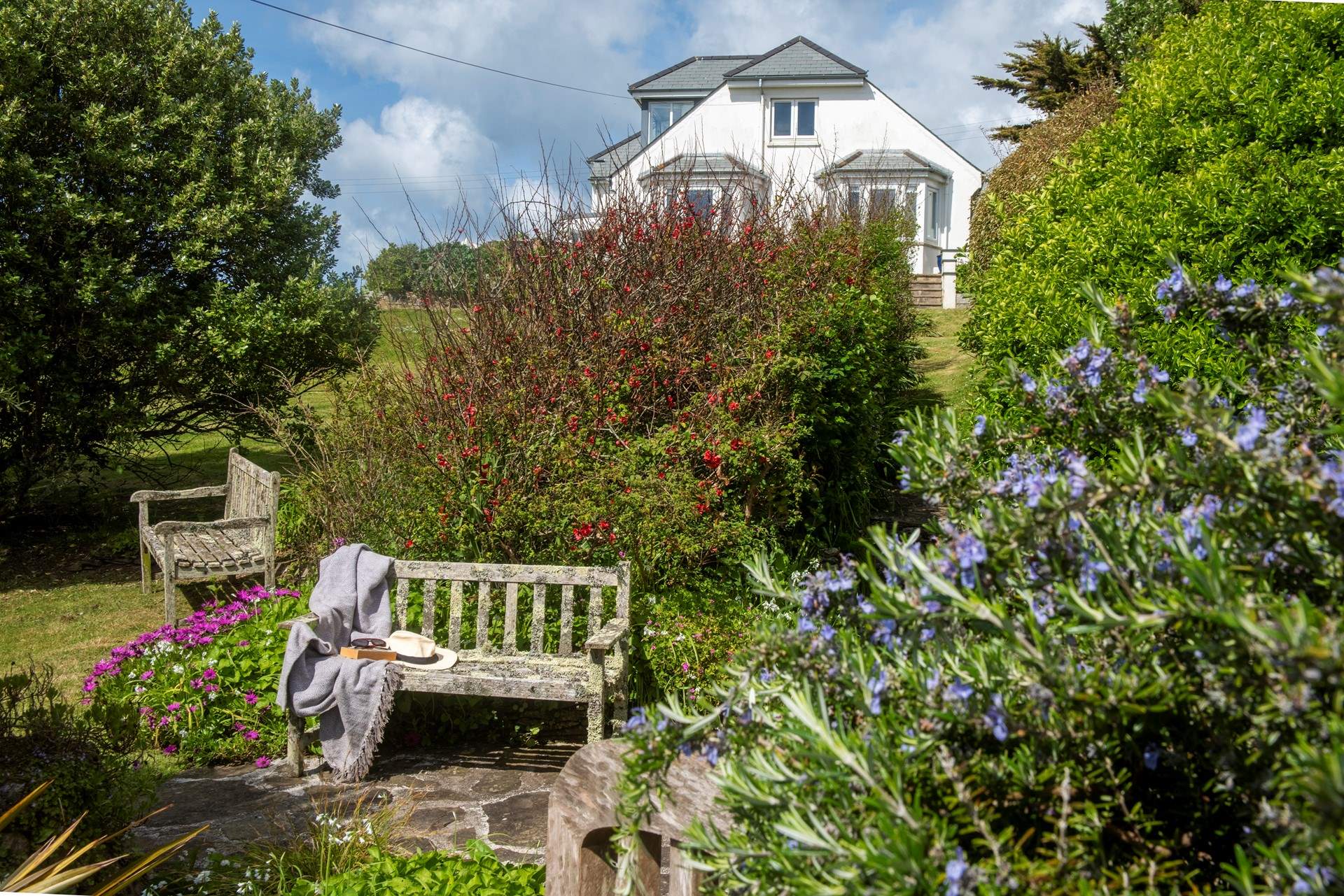 The mature garden has been landscaped to maximise views, and shelter from the elements.