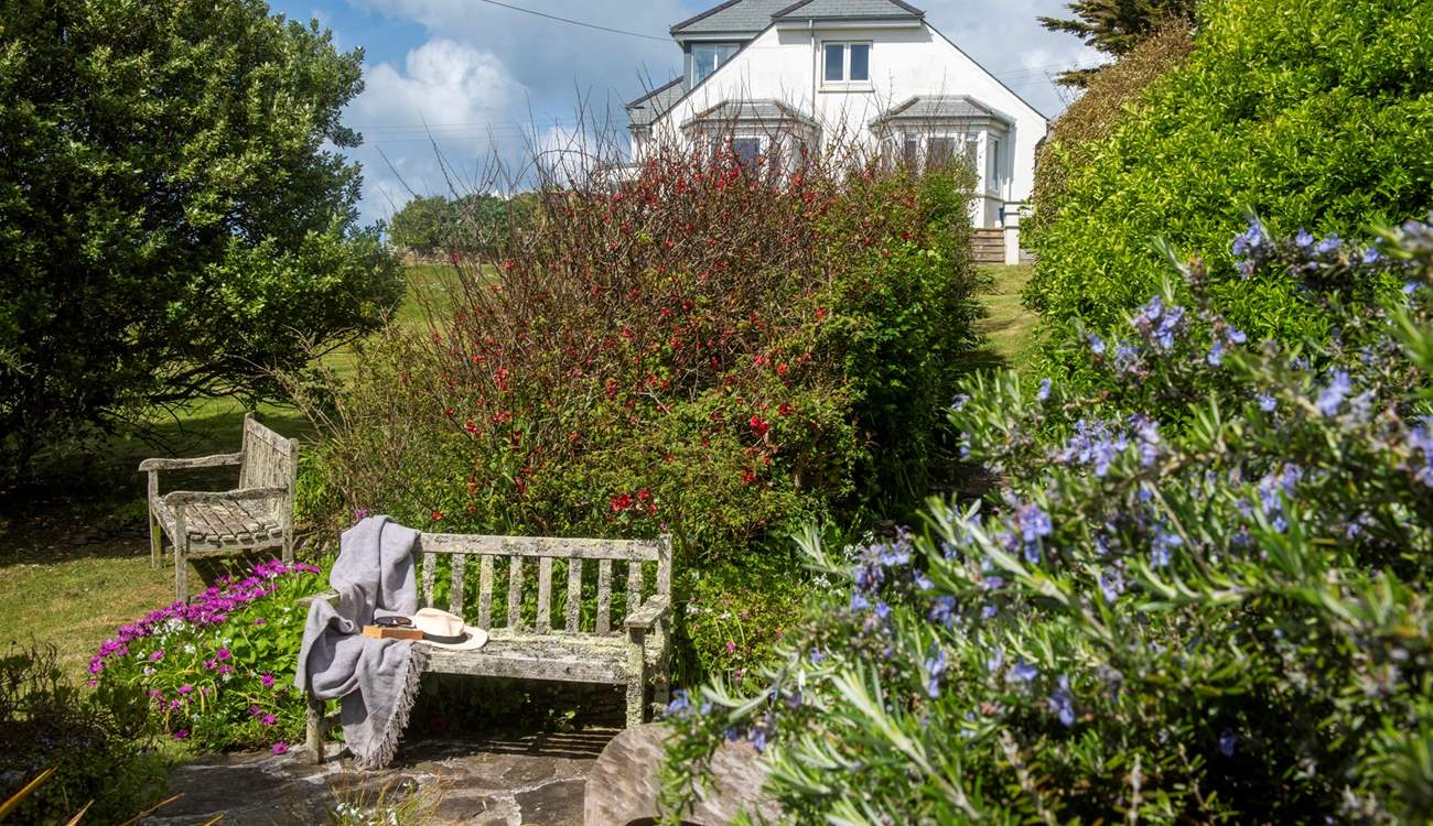 The mature garden has been landscaped to maximise views, and shelter from the elements.